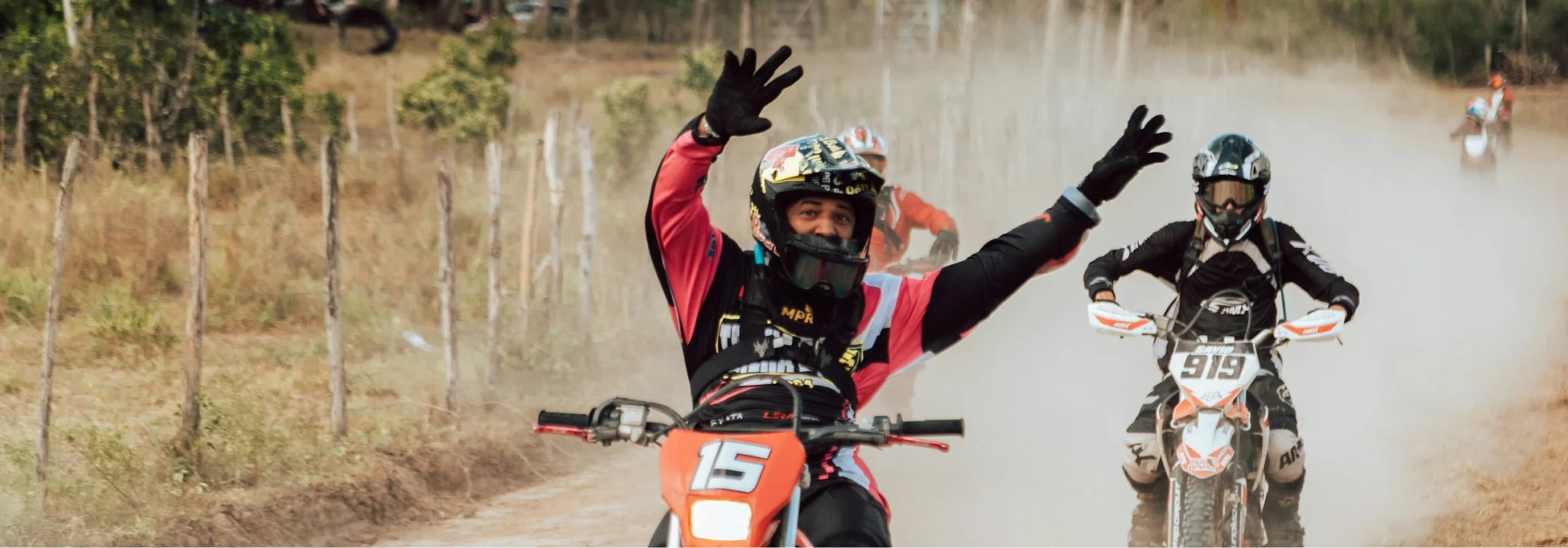 Ovidiu Baila guiding enduro riders on a Carpathian trail near Sibiu